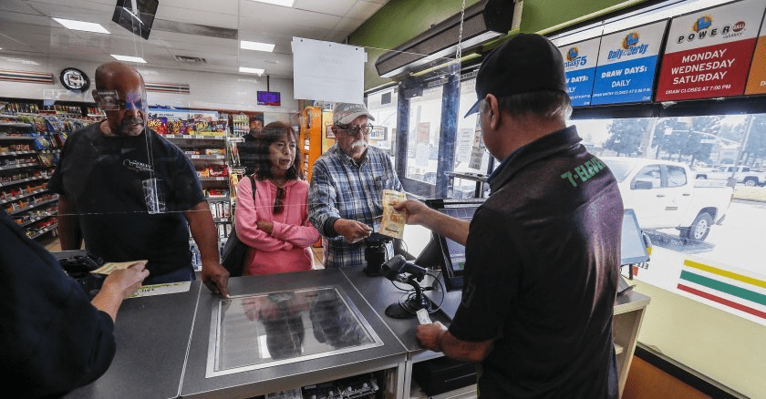 Local lottery agent buying official ticket on behalf of online platform user